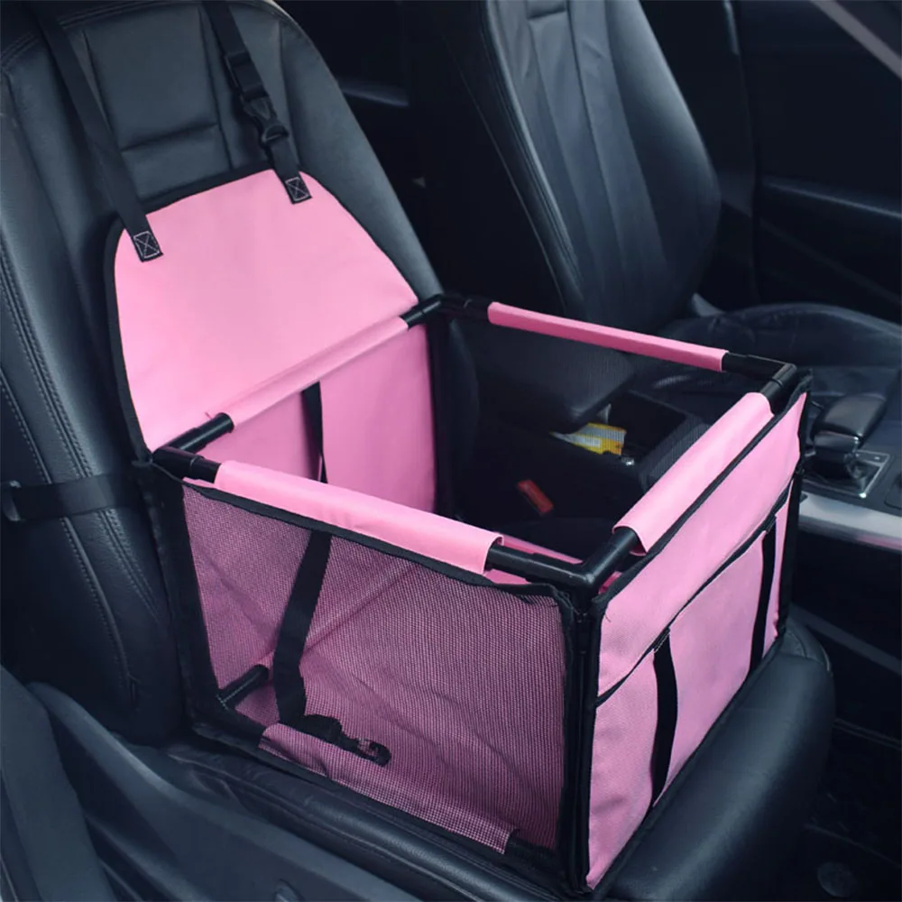 Pink mesh pet car seat cover with a black frame installed on a car passenger seat.