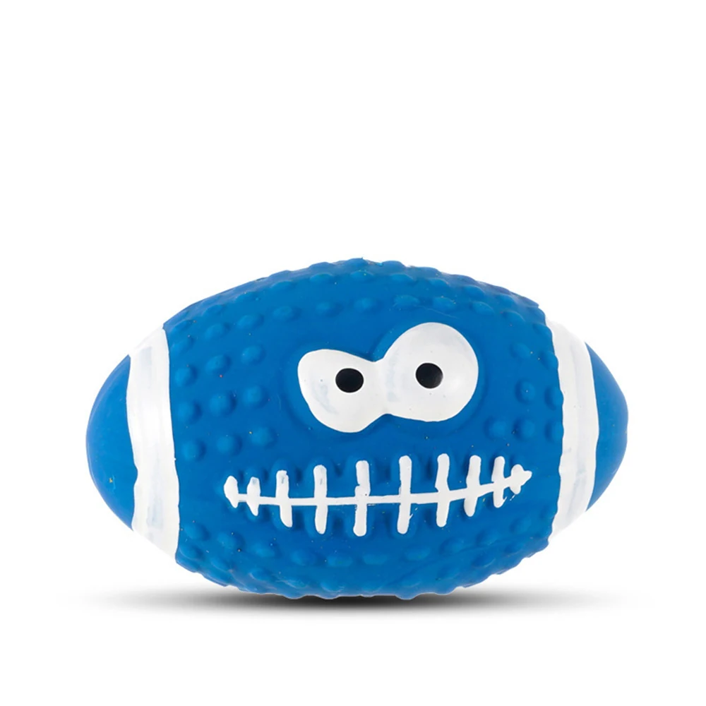 Blue rubber football-shaped toy with googly eyes and white laces on a white background