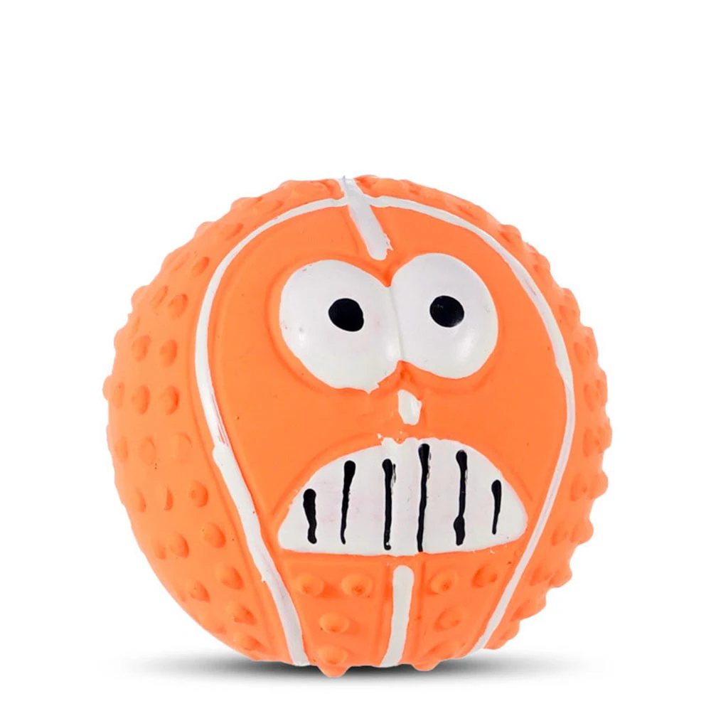 Orange rubber ball with bumpy texture and a painted face featuring large eyes and a grimacing mouth