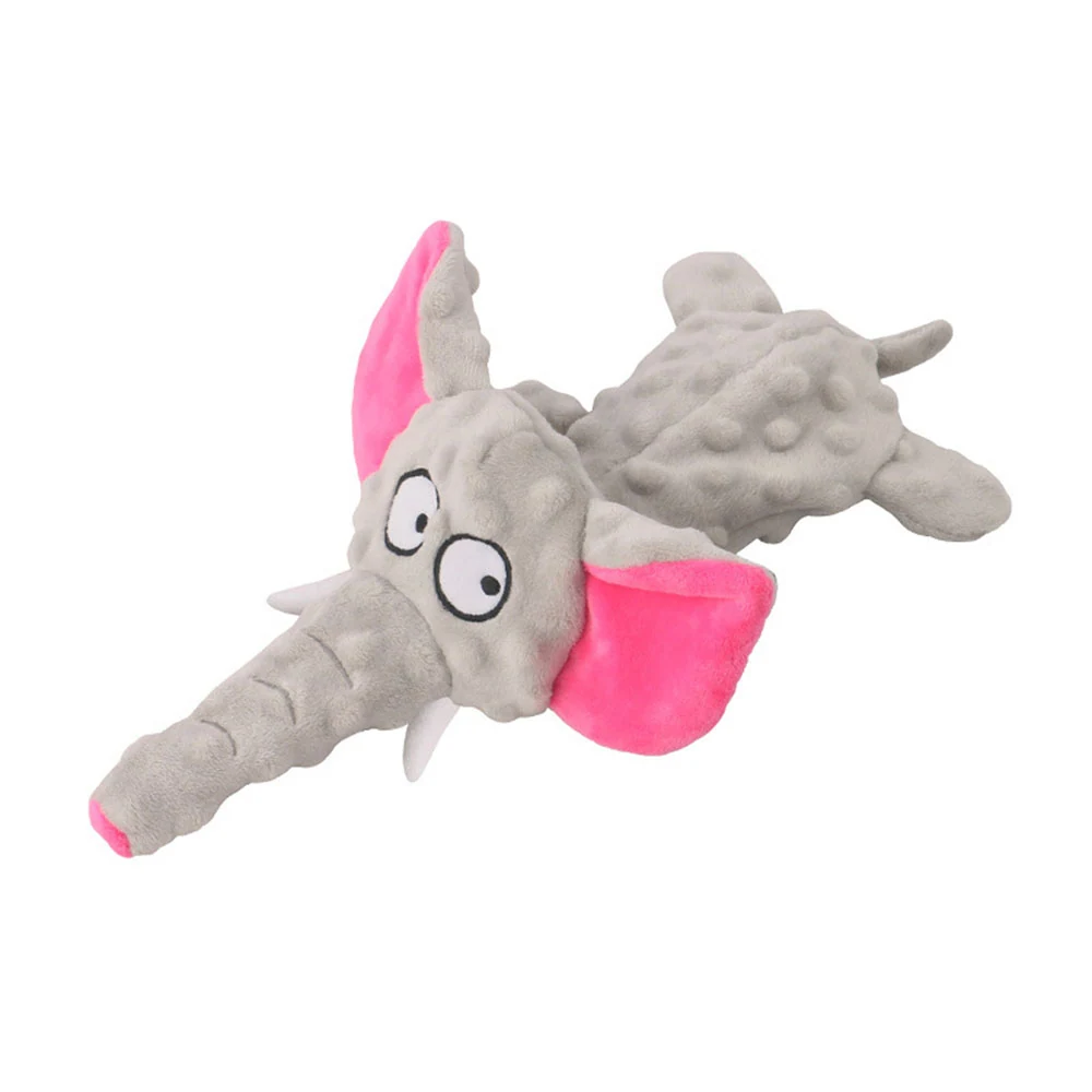 Grey plush elephant toy with pink ears lying on its side on a white background