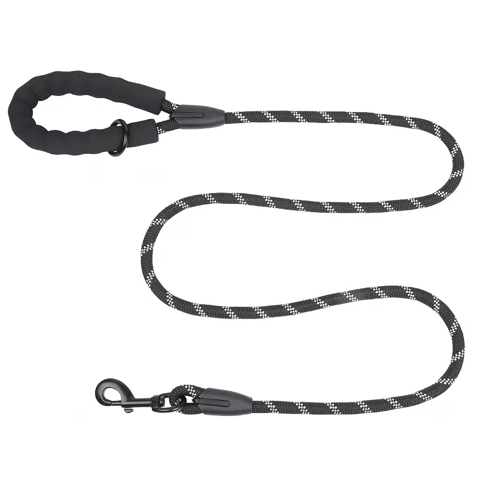 Black and white patterned fabric dog leash with a padded handle and metal snap hook on a white background.