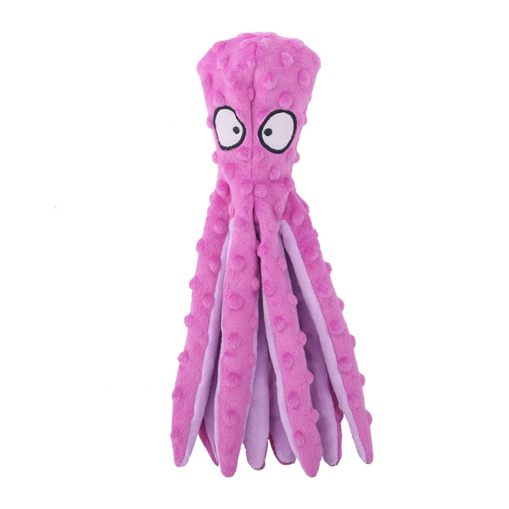 Pink plush octopus toy with embroidered eyes and bumpy texture on white background