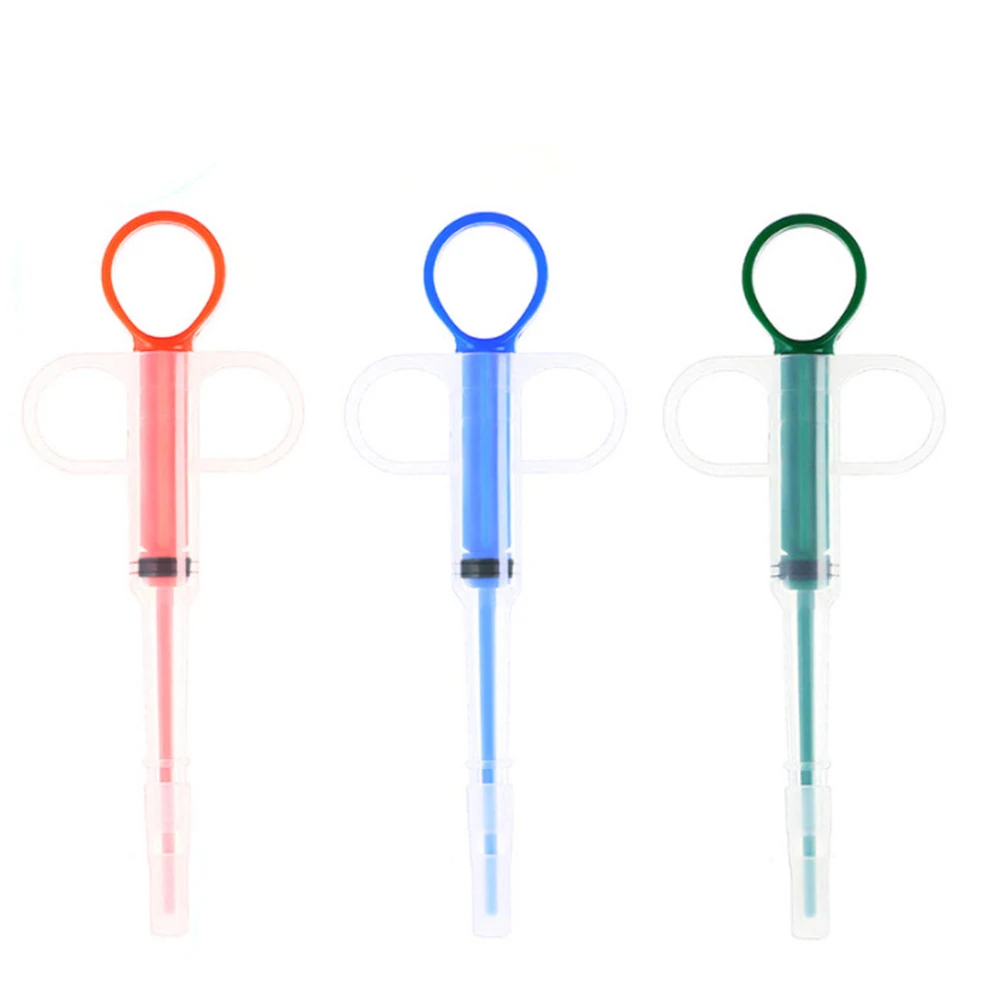 Three syringe-style dispensers with orange, blue, and green plungers and side wings on a white background