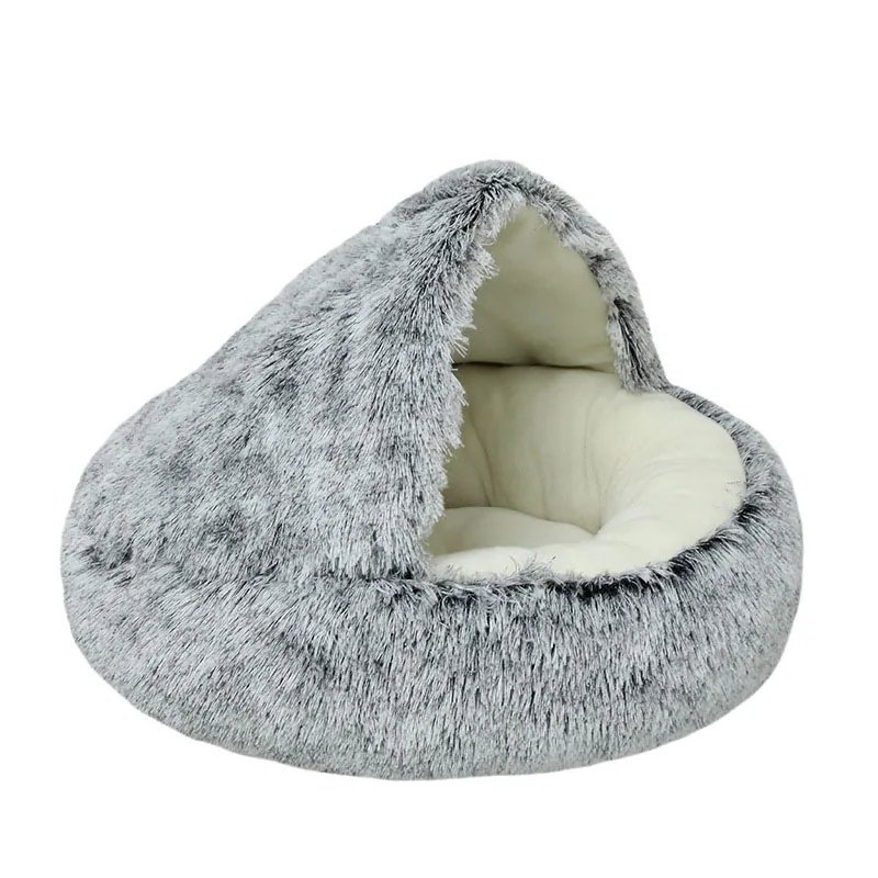 Grey and white faux fur pet bed with a cream-colored interior