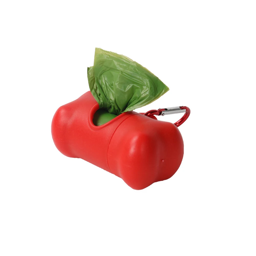 Red dog waste bag dispenser with green bags and carabiner on white background