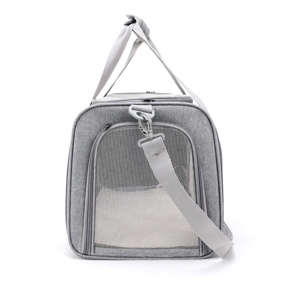 Grey fabric tote bag with a mesh front pocket and adjustable shoulder strap