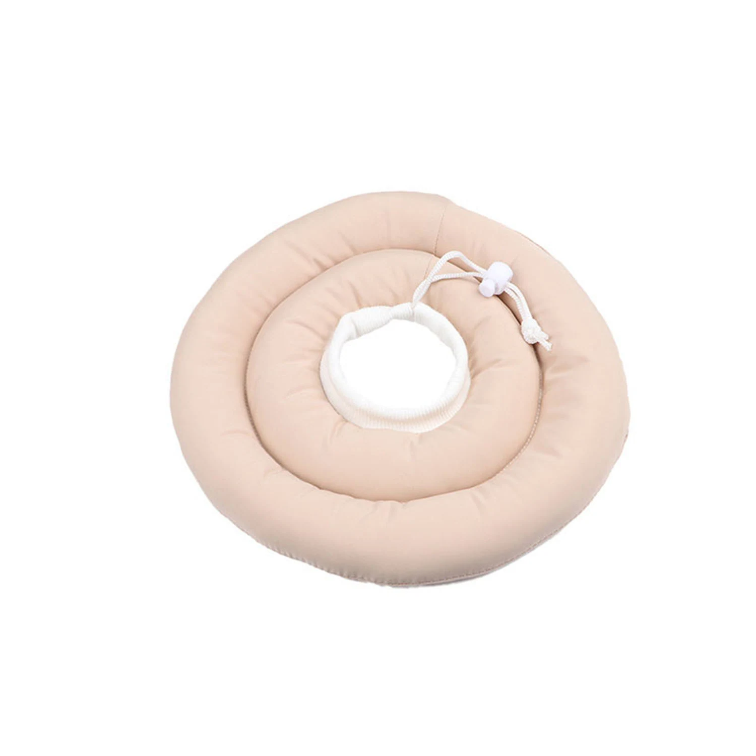 Beige inflatable ring cushion with a central hole and white drawstring closure.