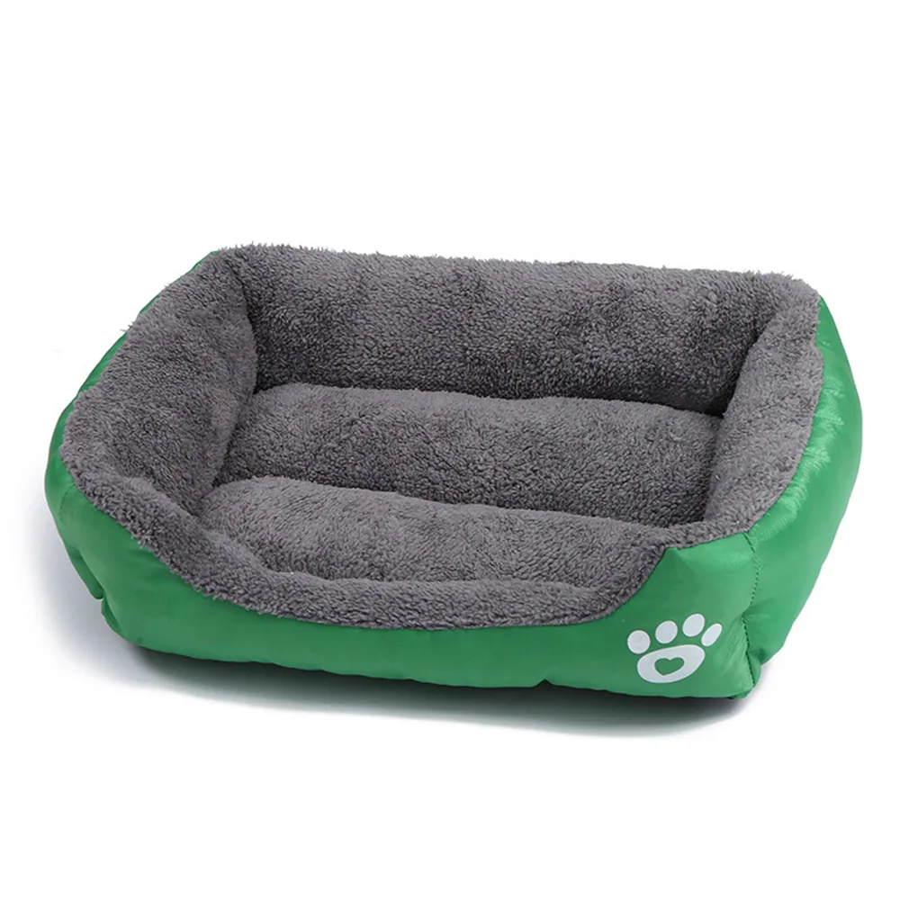 Green and grey rectangular pet bed with a paw print logo.