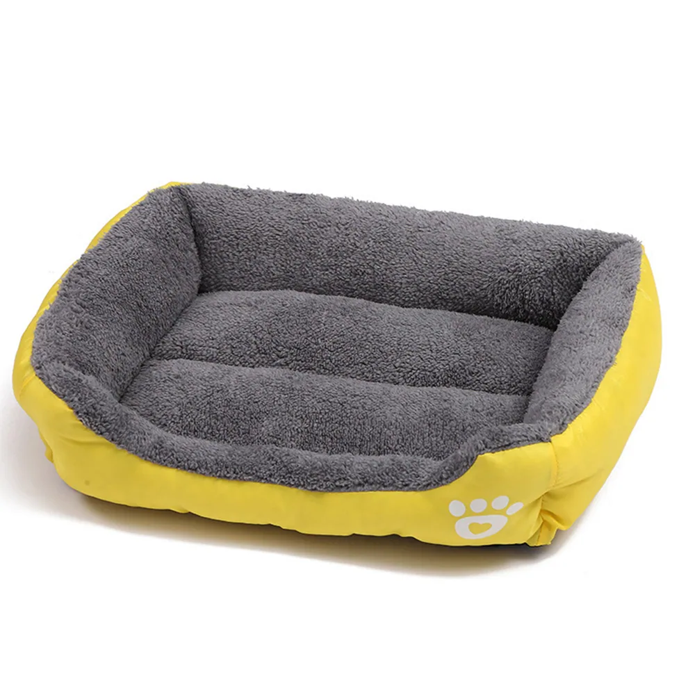 Yellow and gray rectangular pet bed with plush lining and paw print logo