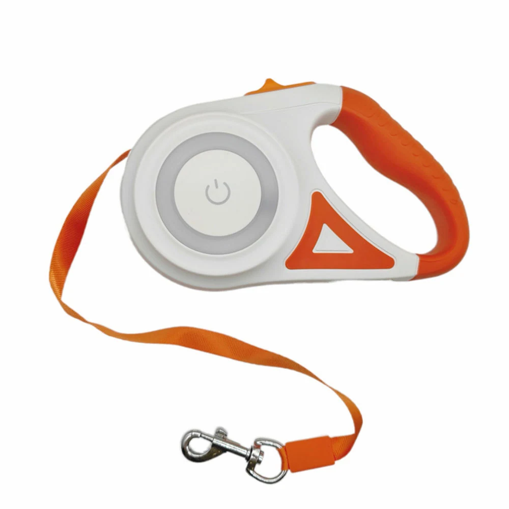 White and orange retractable dog leash with a power button on the casing