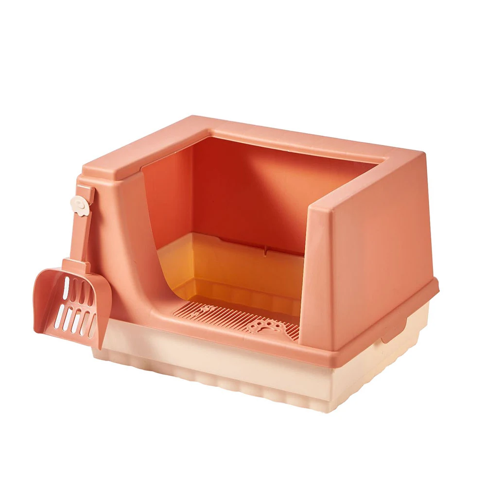 Peach colored enclosed litter box with a matching scoop attached to the side