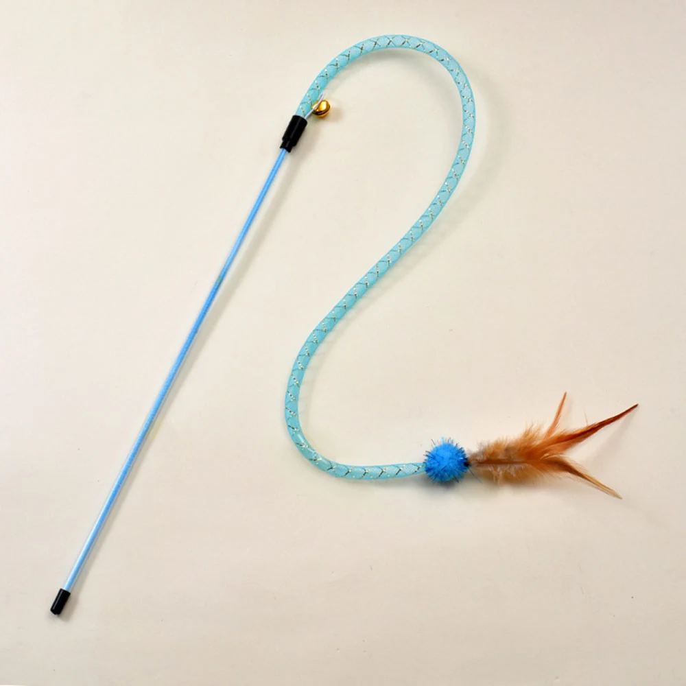 Light blue cat wand toy with a coiled string, a small bell, and a feather attachment on a white background.