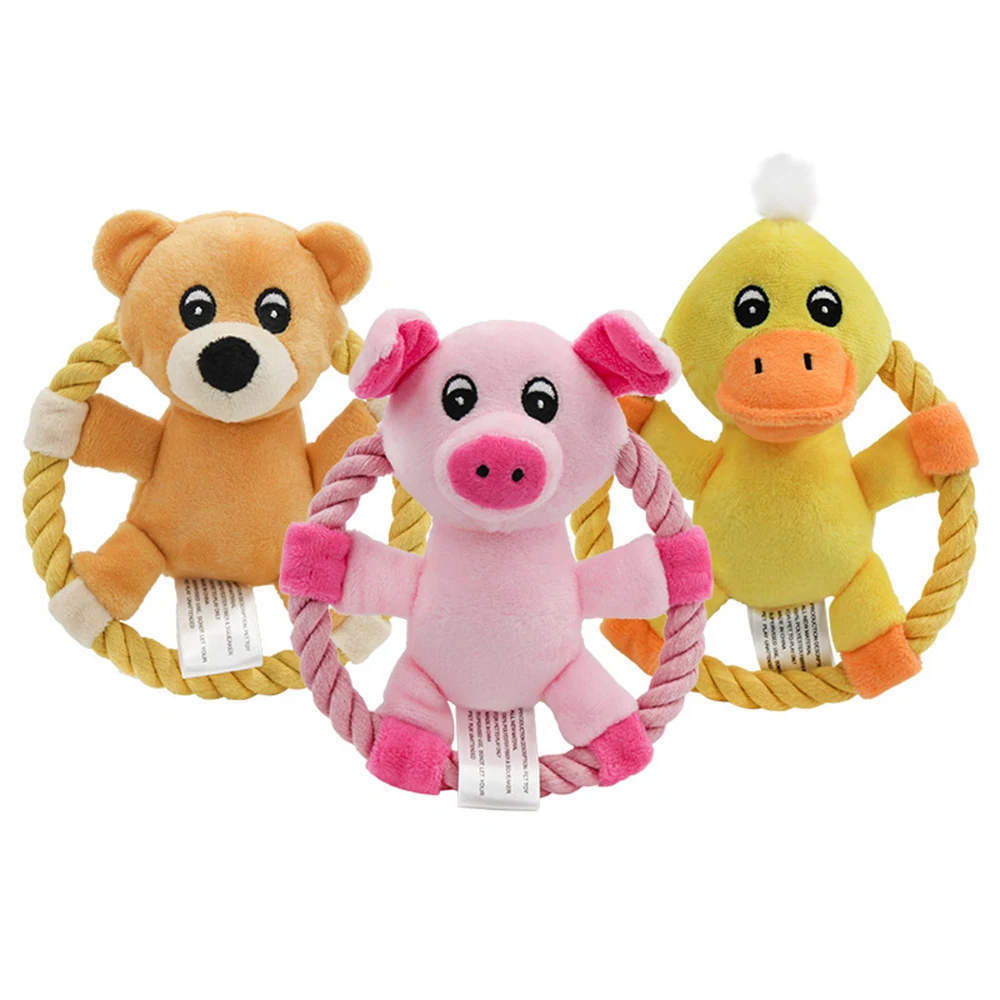 Three plush animal dog toys with rope handles: a brown bear, a pink pig, and a yellow duck.