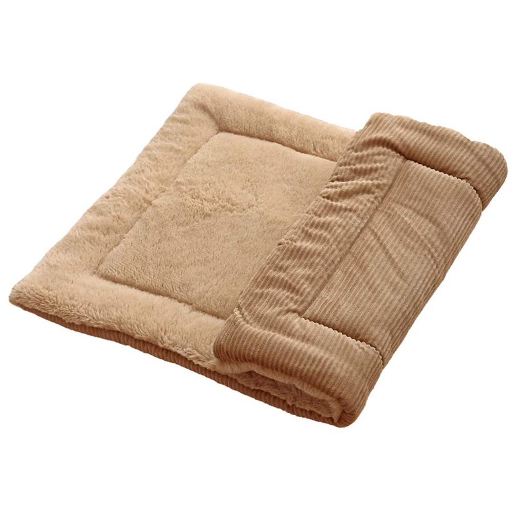 Beige reversible cushion featuring a plush fleece surface and a folded section revealing brown corduroy fabric.