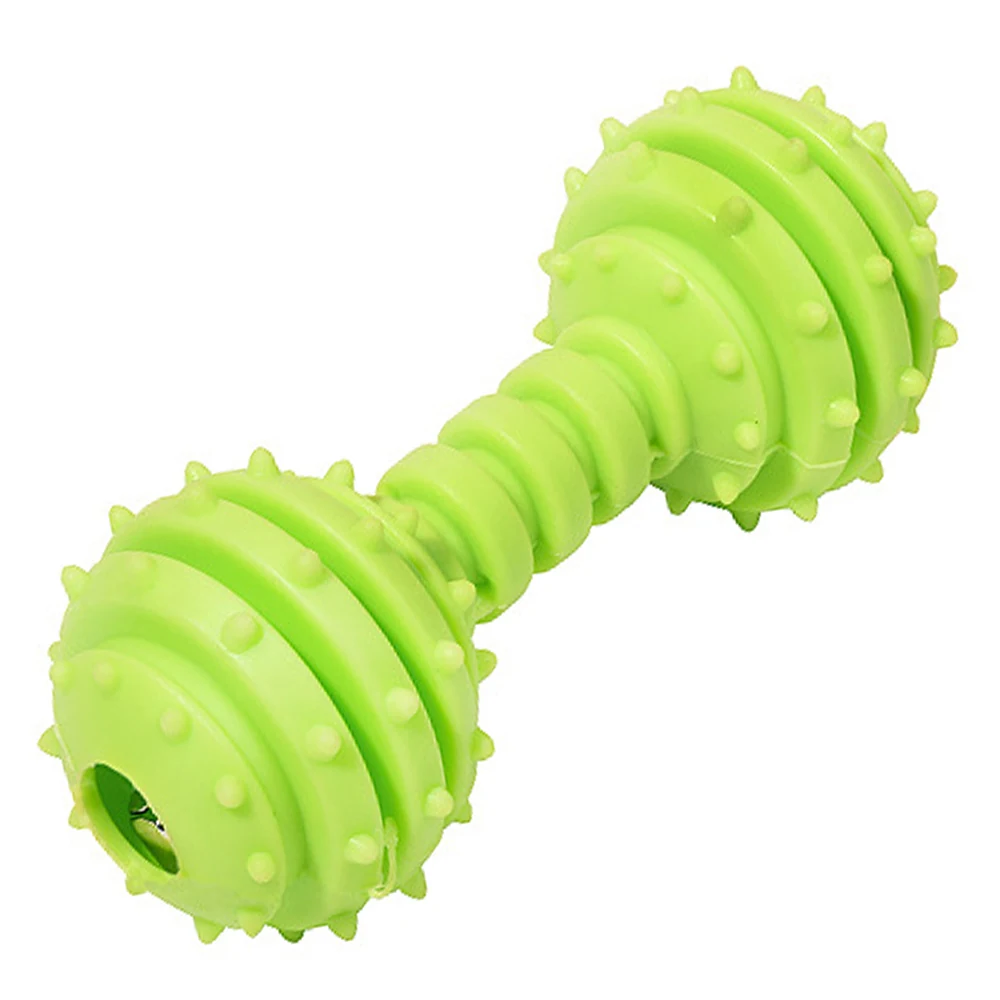 Green rubber dumbbell-shaped dog chew toy with spikes and ridges on a white background