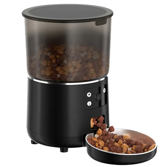 Black automatic pet feeder with clear hopper full of kibble and a stainless steel bowl