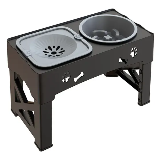 Black elevated dog bowl stand with a slow feeder tray and puzzle bowl