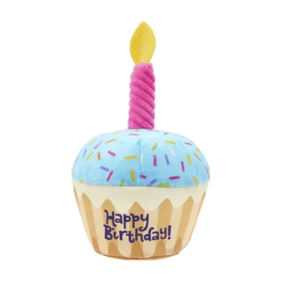 Plush cupcake toy with blue frosting, pink candle, and embroidered Happy Birthday text on a white background