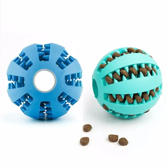 Blue and teal silicone puzzle balls filled with kibble on a white background