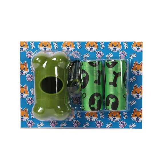 Retail packaging containing a green bone-shaped dog waste bag holder and three rolls of green bags with paw prints.