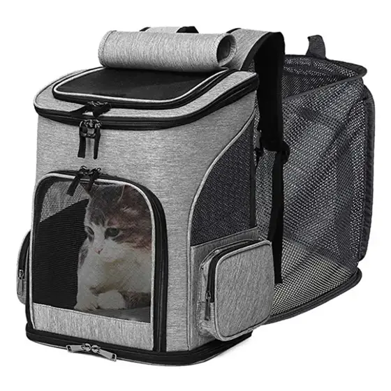 Grey pet backpack carrier with mesh windows containing a cat