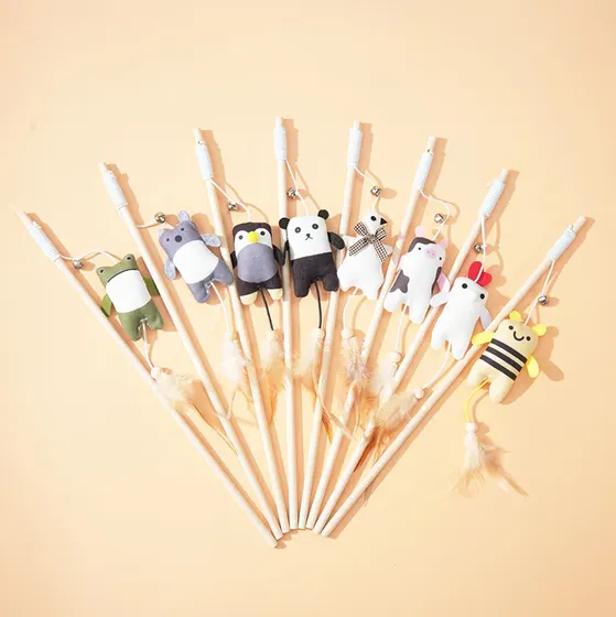 Fan-shaped arrangement of eight plush animal cat teaser wands on a beige background