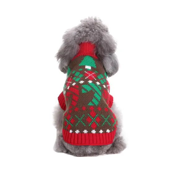 Back view of a grey dog wearing a brown, red, and green knitted Christmas sweater.