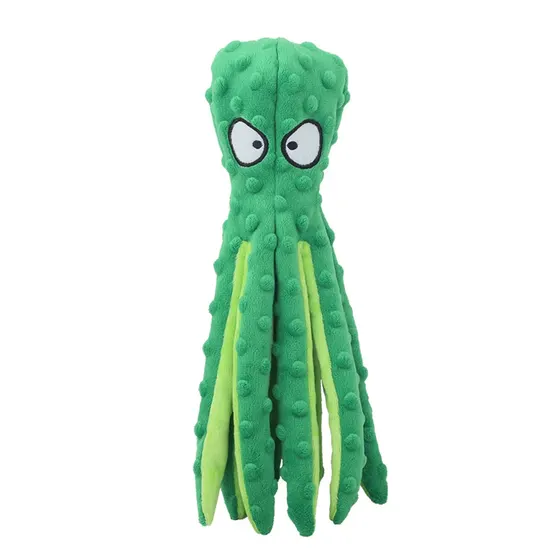 Green plush octopus toy with textured bumps and large cartoon eyes on a white background