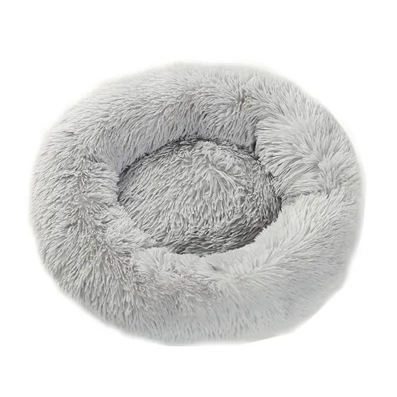 A round, fluffy gray pet bed with a raised rim and soft center.