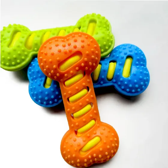 Three bone-shaped dog chew toys in green, blue, and orange with yellow centers.