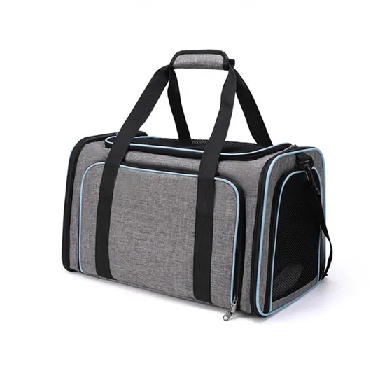 Grey fabric pet carrier bag with black straps and blue piping