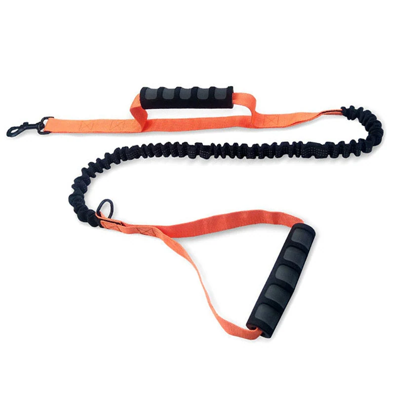 Orange and black resistance pull rope with foam handles and carabiner clip on a white background.