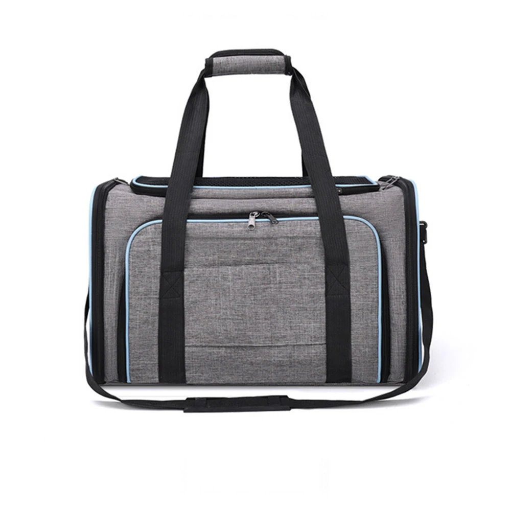 Grey soft-sided bag with black handles, adjustable shoulder strap, and light blue piping on a white background.
