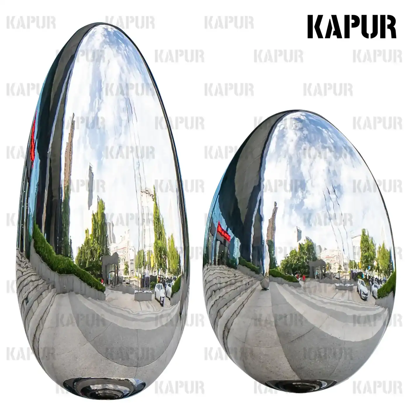 Egg-shaped oval stainless steel sculpture standing on a paved outdoor plaza with reflective surface