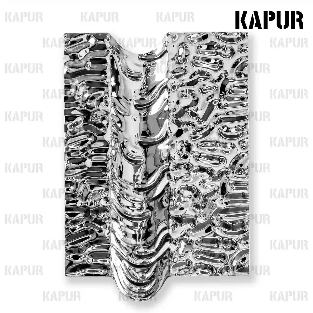 Polished stainless steel water ripple wall sculpture hanging on a modern interior wall with ambient lighting
