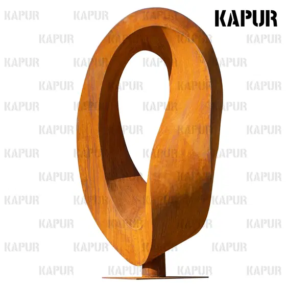 Large corten steel Möbius ring sculpture standing in a garden, showing the continuous loop and weathered surface