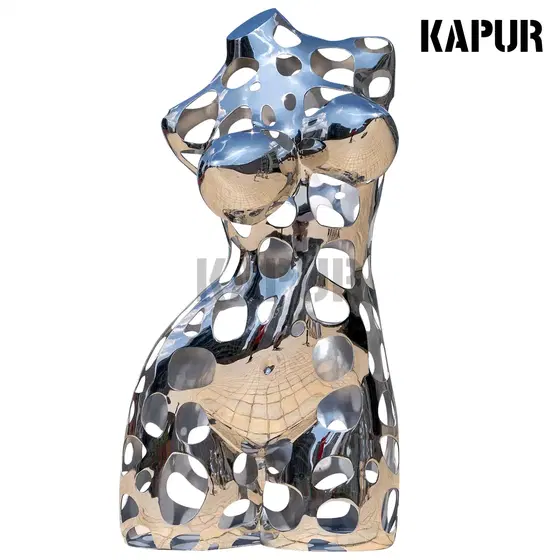 Abstract hollow half-body woman sculpture in polished stainless steel standing on a paved outdoor plaza