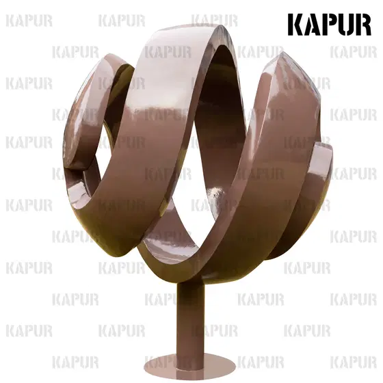 Mirror-polished stainless steel sphere sculpture standing on a paved outdoor plaza, reflecting the sky and surrounding architecture