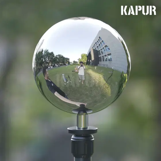 Polished 126mm reflective ball with 1/4UNC thread, placed on a studio surface under controlled lighting