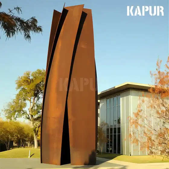 Large corten steel outdoor sculpture standing in a garden with natural rust patina, viewed from the front