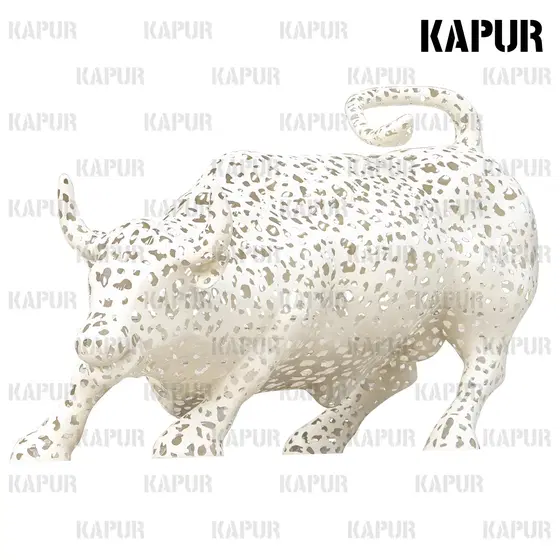 Large hollow-out buffalo animal sculpture in polished stainless steel standing in an outdoor landscape setting