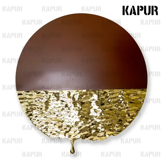 Mirror-polished stainless steel water ripple wall decoration mounted on a white interior wall, reflecting light and showing undulating curves