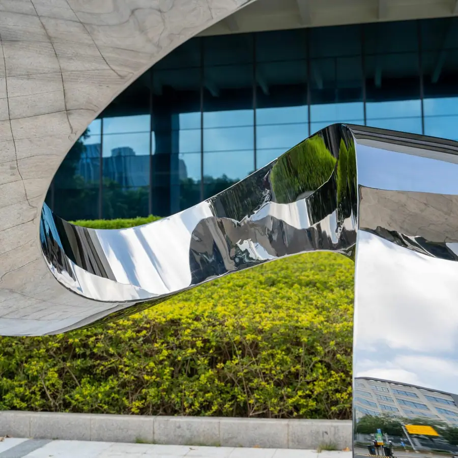 Large outdoor stainless steel streamer sculpture