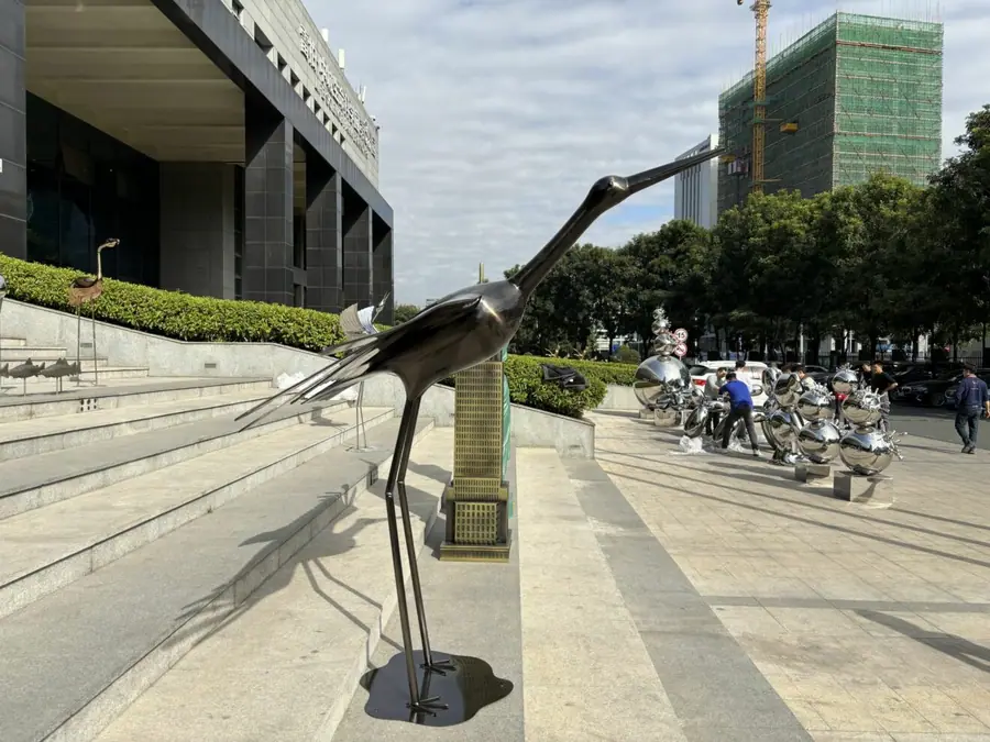 metal crane sculpture