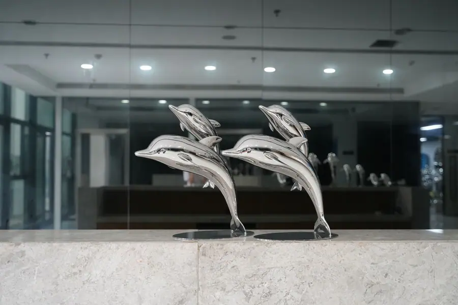 stainless steel dolphin sculpture