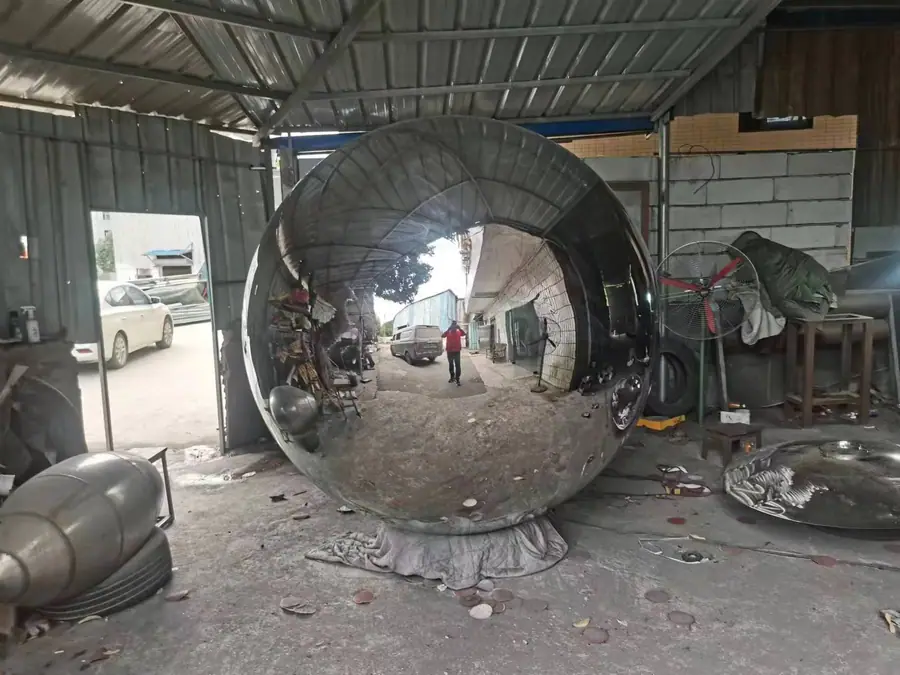 Exploring the beauty of craftsmanship in making large outdoor stainless steel spheres