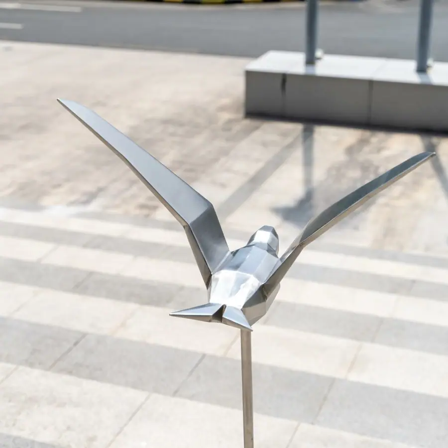 Stainless steel bird sculpture