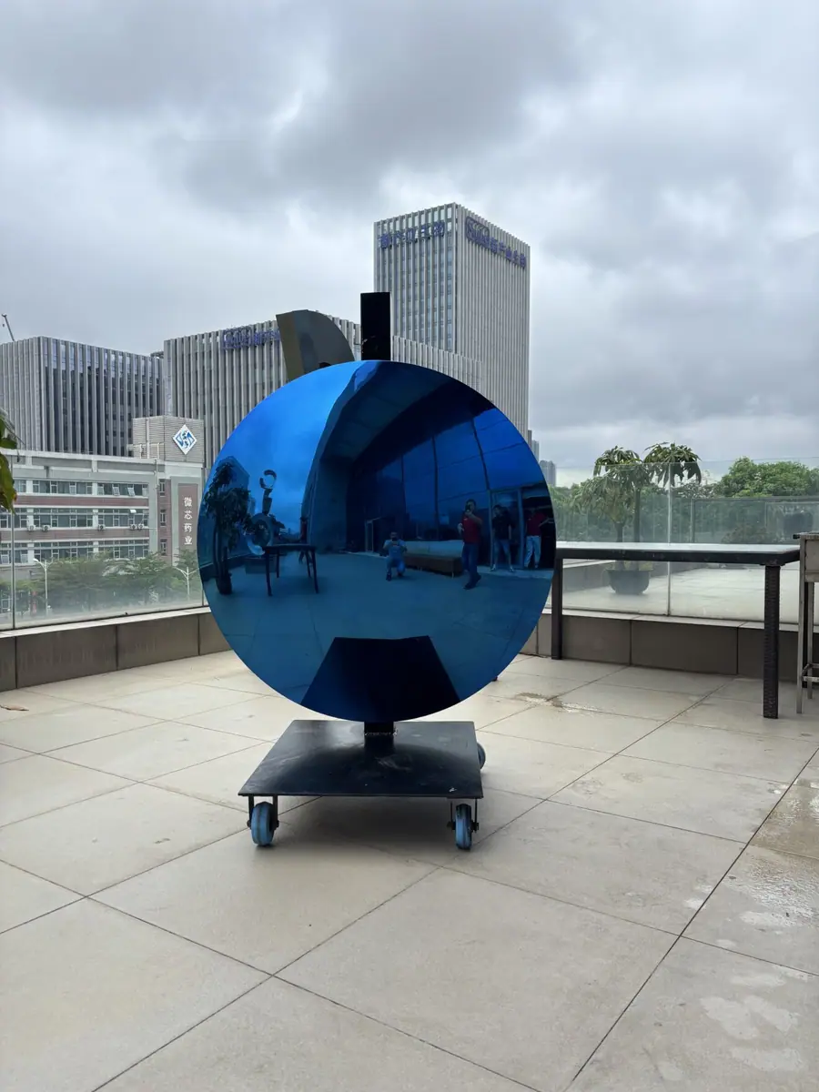 mirrored blue sculpture