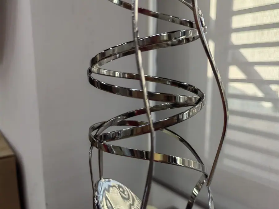 Stainless steel high heel art sculpture