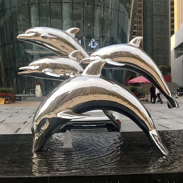 Stainless steel dolphin sculpture: a symbol of love